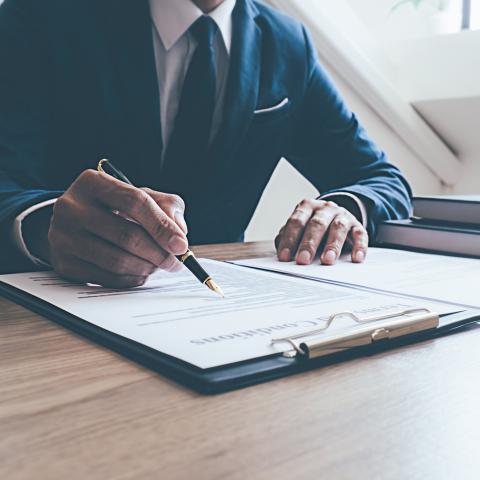 Man looking over paper work