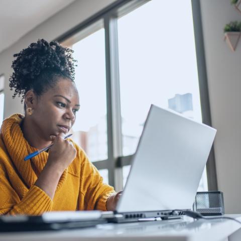 woman looking at computer